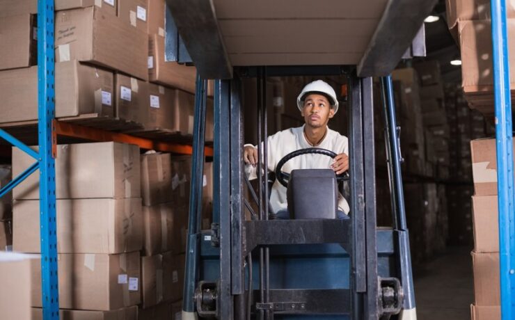 forklift-driver-operating-machine_13339-57243